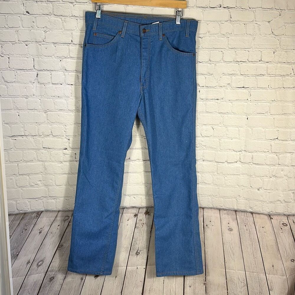 Vintage Levi's 90s Bootcut Mens’‎ Light Wash Jeans Denim size 36 x 32 Brown Tab